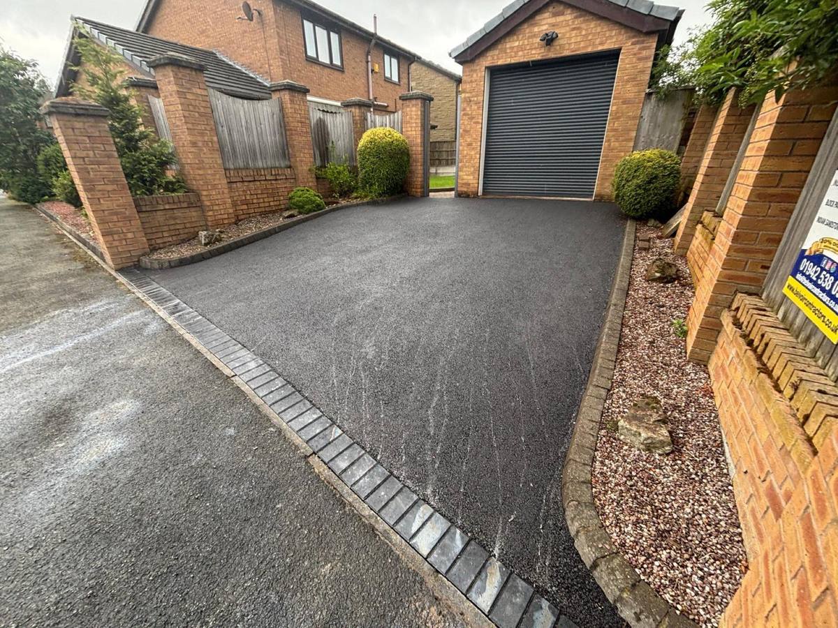 Tarmac driveway with block paved edging laid by Belvoir Contractors in Handforth
