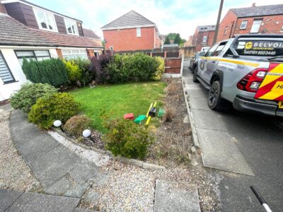 Qualified Tarmac Driveway With A Featured Gravel Area With Black Ice Gravel With A Border And Circle For Planting contractors in Manchester