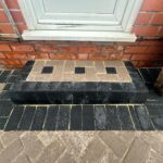 Block paved steps with charcoal edging