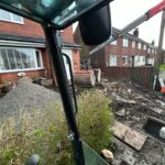Front garden excavated ready for a block paved driveway and steps