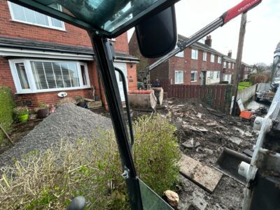 Front garden excavated ready for a block paved driveway and steps